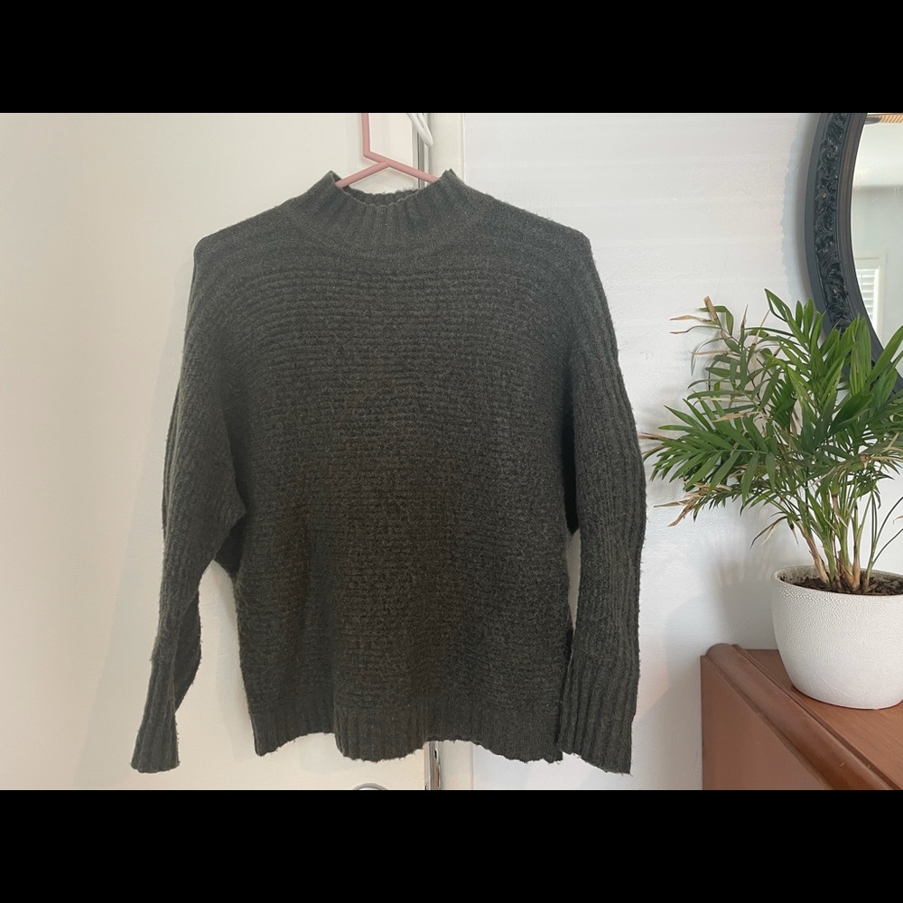 green sweater